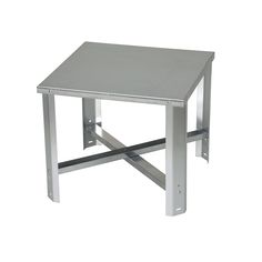 a small metal table sitting on top of a white floor with no one around it