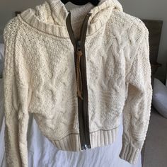 Nwt Free People Cropped Knit Hoodie. Size Xs. Cozy Cotton Knit Outerwear, Casual Cream Tops For Cold Weather, White Knitted Hoodie For Fall, Cream Cable Knit Cotton Outerwear, Cozy Hooded Knit Sweater, Cream Cotton Cable Knit Outerwear, Casual Knit Sweater In Winter White, Cozy White Knitted Hoodie, Casual Cream Knit Outerwear