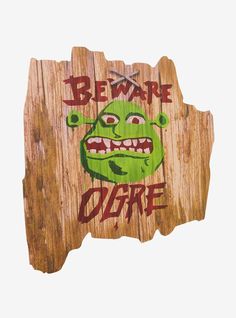 a wooden sign that says beware of the office with an image of a green monster on it