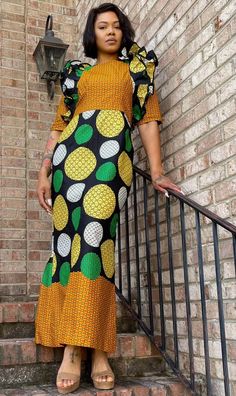 This ankara dress is great any occasion. Makes great summer looks, too. Made with 100% Cotton ankara fabric Fabric does not stretch. It has a zipper on the back Care Instructions - Machine Wash and Air Dry or Dry Clean Fitted Printed Maxi Dress In Ankara Fabric, Fitted Ankara Fabric Maxi Dress With Short Sleeves, Yellow Fitted Ankara Fabric Dress, Summer Maxi Dress In Ankara Fabric With Short Sleeves, Printed Ankara Maxi Dress, Fitted Ankara Maxi Dress For Spring, Casual Fitted Dress With Bold Print, Fitted Short Sleeve Patterned Maxi Dress, Fitted Patterned Maxi Dress With Short Sleeves