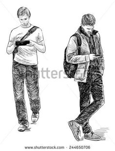 two young men walking down the street, one is looking at his phone and the other is