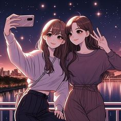 two young women taking a selfie with their cell phones in front of the night sky