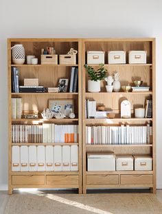 a wooden bookcase filled with lots of books