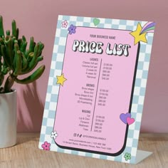 a pink price list sign next to a potted plant