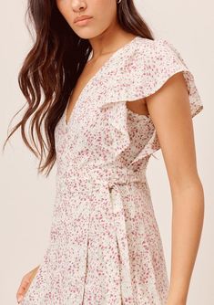 Cute Flutter Sleeve Floral Wrap Maxi Dress | LOVESTITCH Flowy V-neck Ruffle Dress For Garden Party, Feminine V-neck Tiered Summer Dress, Summer Dress With Ruffled Skirt And Flutter Sleeves, Summer Sundress With Flutter Sleeves, Flirty Ruffled Wrap Dress, Flirty Spring Wrap Dress With Tie Waist, Flirty Wrap Dress With Ruffles, Flirty Dress With Ruffle Hem And Surplice Neckline, Beach Maxi Dress With Ruffle Hem And Short Sleeves