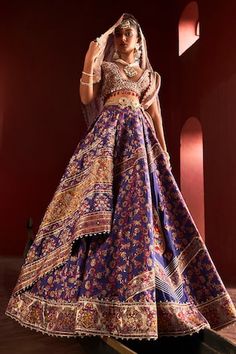 Purple kani silk attached cancan lehenga in floral pattern with sequin, dori, zari and pearl work. Paired with a padded all over embroidered blouse with a tasseled hem, sleeves and back, dupatta with sequin and applique work and embellished belt. - Aza Fashions Luxury Draped Cutdana Lehenga, Purple Dola Silk Lehenga With Cutdana, Bohemian Lehenga With Floral Print And Traditional Drape, Purple Embellished Lehenga With Traditional Drape, Luxury Purple Floral Embroidered Lehenga, Pearl Lehenga, Aditi Gupta, Purple Lehenga, Cancan Lehenga