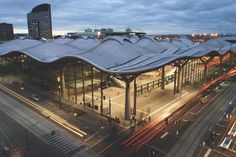 an aerial view of a train station at night