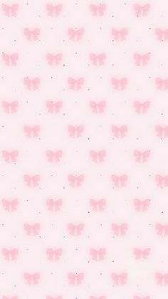 a pink background with small bows on it