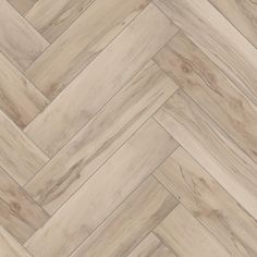 an image of wood flooring that looks like chevron herringbones in grey tones