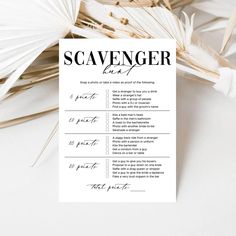 a scavenger game is shown on top of some paper fanned palm leaves