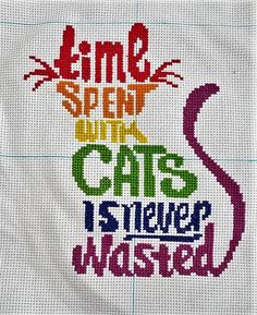 a cross stitch pattern with the words time spent with cats is never wasted