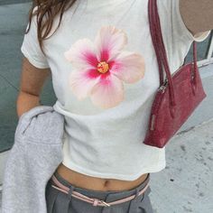 We get it, you want to live your best coastal beach girl summer, even if you're not on an island. This Y2K & 90s style Hibiscus flower baby tee is super cute and has just the right amount of color to wear with even the most basic summer outfits! FAST PRODUCTION AND TURN AROUND TIME WITH A STAR SELLER RATED STORE 💖⭐ SIZING This style is waist length and slim fit - size down for extra tight fit and shorter length!  RETURN POLICY Please check our shop policies FAQ for more info!  About SUGAR FACE Flower Y2k, Basic Summer Outfits, Coastal Grandma, Summer Girl, Tropical Flower, Italian Summer, Hibiscus Flower, 90s Style, Girls Tees