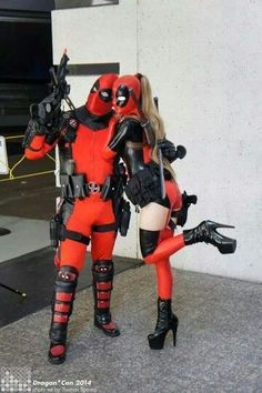 two women dressed as deadpools standing next to each other