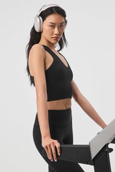 When you want the coverage of a tank and the support of a bra, reach for this. The Real Bra Tank has wide straps, a flattering V-neck, a built-in shelf bra and a racerback. Made from our signature Airbrush fabric that’s super soft with medium compression, you’ll go from Pilates to perusing the farmers market without missing a beat. Bra Tank, Woman Back, Back Women, Shelf Bra, Alo Yoga, Wide Straps, Bra Tops, Farmers Market, Pilates