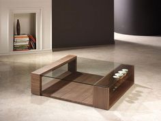 a modern coffee table in the middle of a room