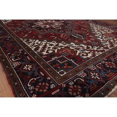 Rug Features: Style: Heriz Weave Type: Hand Knotted KPSI: 140 Knots Per Square Inch Age: 30-35 Years Old Condition: Very Good Primary Color: Red Color Details: Blue | Navy Blue | Burgundy | Brown | Ivory | Beige | Pink Size in Feet: 6' 11'' x 9' 11''… Dark Red Area Rug, Burghandy Rug, Burgundy Bohemian Rug, Red Turkish Rug, Burgandy Persian Rug, Red Wool, Vintage Area Rugs, Wool Carpet, Rug Store