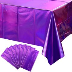 purple table cloths and fan on white background