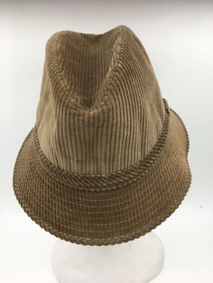 Men's Vintage Bucket hat by Oxford hats circa 1960. Beige hat in 100% cotton corduroy,  quilted lining, and inside sweat rim.  Downturned brim with stitching to keep its shape. made in France Excellent condition-dead stock original tags attached.    Circumference 55.00 cm, the height of 10.00 cm, brim 5.00 cm.  To determine your hat size, measure the circumference around your head with a measure tape or string, keeping the string level and firm, across the temples and above the eyebrow ridges. M Vintage Bucket Hat With Flat Brim For Outdoor, Vintage Flat Brim Bucket Hat For Outdoor, Vintage Adjustable Bucket Hat With Flat Brim, Vintage Hats For Outdoor, Winter Corduroy Hat With Curved Brim, Vintage Winter Bucket Cap, Vintage Winter Bucket Hat, Retro Corduroy Hat With Curved Brim, Vintage Bucket Hat With Short Brim