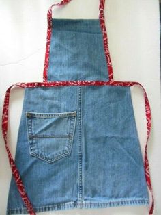 an apron made out of jeans with red straps