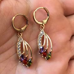 18kt Gold Filled, Purple Amethyst,Green Peridot, Red Ruby, Open Leaf, Drop, Dangle Earrings. 100% New, Authentic And Boutique! Taco Earrings, Green Statement Earrings, Thick Gold Hoop Earrings, Gem Drop Earrings, Mom Earrings, Vintage Clip Earrings, Jade Earrings, Beaded Drop Earrings, Sparkle Earrings