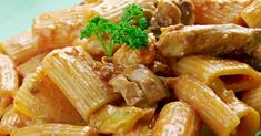 pasta with meat and vegetables on a plate