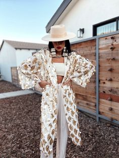 "Matte Gold Disc Sequin Maxi Kimono. Cream base, diamond shape fringe gold sequins, double lined, oversize kimono.   Perfect addition to party outfits, night outs, festival or photoshoot styles.  Size S - US 0/4 Size M - US 4/8 Size L - US 8/12 Model is 5'10 (US 2/4, B 36\", W 26\", H 38\") and wearing size Small on the photos.  * Due to monitor differences, colors can vary slightly. Please reach out before you place an order if you are not sure about the color/tone." Boho Glam Fashion, Bachelorette Matching, Chiffon Outer, Sequin Kimono, Gold Costume, White Kimono, Maxi Kimono, Sheer Kimono, Gold Jacket