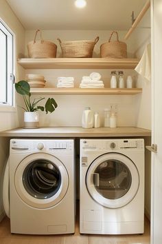 a washer and dryer in a small room with open shelving on the wall