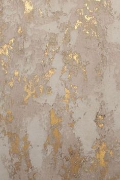 an old dirty wall with some yellow paint on it's walls and the floor