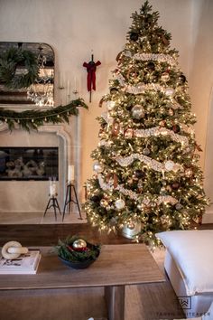 a decorated christmas tree in a living room