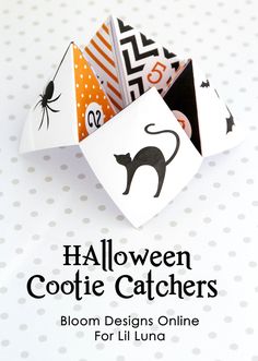 an origami halloween cat and spider with the text, halloween gothic catchers bloom designs online for lil luna