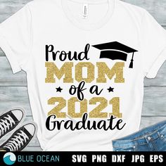 a t - shirt with the words proud mom of a graduate in gold glitter on it