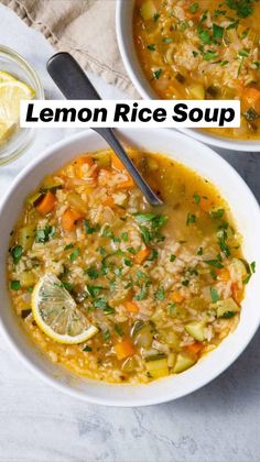 two bowls of soup with lemon and parsley