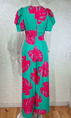 Product Details:- Color Options: Green and Blue Plants, Green and Pink Plants- Sleeve Type: Puff Sleeve- Main Fabric Composition: Polyester- Available Sizes: S, M, L, XL- Pants Type: Wide Leg- Style: Jumpsuit Size: Green Floral Print Jumpsuits And Rompers For Party, Summer Short Sleeve Jumpsuits And Rompers For Party, Summer Party Jumpsuits And Rompers With Short Sleeves, Green Short Sleeve Jumpsuits And Rompers For Summer, Summer Green Jumpsuits And Rompers For Party, Fitted Green Summer Jumpsuit, Green Summer Jumpsuit For Party, Summer Party Jumpsuit In Green, Green Summer Party Jumpsuits And Rompers