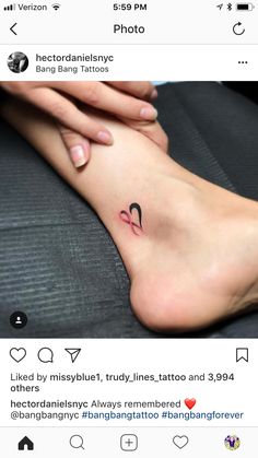 a person with a small tattoo on their foot