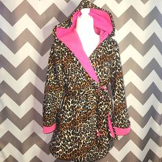 Like Brand New!!! No Flaws! This Wrap Style Robe From Betsey Johnson Is 100% Polyester Fleece Fabric With A Brown, Black And Cream Leopard Print And A Bright, Hot Pink Lining. The Robe Has An Attached Belt, Hood, And Pockets. 19.5" Wide (Pit-To-Pit) 33" Long 23" Sleeve Ships Same Or Next Day! Smoke Free Home. Fitted Leopard Print Sleepwear For Loungewear, Sleepwear Robe, Betsey Johnson, Wrap Style, Fleece Fabric, Women's Intimates, Leopard Print, Hot Pink, Black Pink