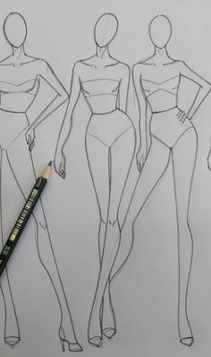 three female mannequins are shown with a pencil in front of the drawing