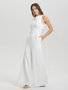 Elevate your special occasion attire with our Lace Top Solid Jumpsuit. The sleeveless design and cross back complement the elegant lace detailing, while providing comfort and ease of movement. This versatile pantsuit is perfect for the mother of the bride, offering an elevated and modern look. Bride Pantsuit, Bridal Pantsuit, Bridal Pants, Wedding Pantsuit, Bridesmaid Dresses Dusty Sage, Bridesmaid Dresses Satin, Dress Satin Bridesmaid, Elegant Jumpsuit, Floral Bridesmaid Dresses