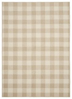 a beige and white checkered rug