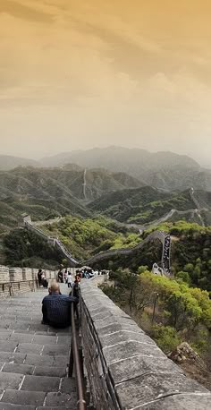 people walking up the great wall of china