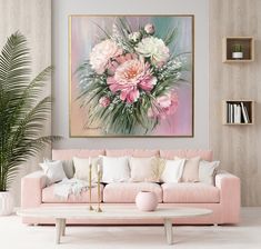 a living room with pink couches and paintings on the wall above them, along with potted plants