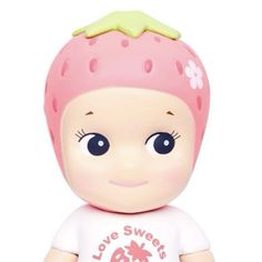 a small toy with a pink strawberry on it's head and the words i love sweets