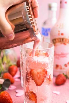 pouring the Baileys strawberries and cream pink recipes to the glass Pink Recipes