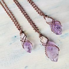 "Raw Amethyst Quartz necklaces. Oxidised Copper Wire wrapped beautiful good quality Amethyst Crystal necklace. Layers great with other necklaces. Love stone necklace. February birthstone. Choose your necklace length with a choice of 16\", 18\", 20\", 22\", 24\", 30\", 32\". These are Raw Natural Gemstones and vary in shape, color and size, each one is unique in its own way. Amethyst is a meditative and calming stone which works in the emotional, spiritual, and physical planes to provide calm, balance, patience, and peace. Amethyst is used as beneficial when dealing with legal problems and money issues, which can lead to prosperity and abundance, though it is not the best known prosperity stone. Emotionally, amethyst is used in crystal healing to help heal personal losses and grief, bringin Handmade Purple Crystal Necklaces, Crystal Pendant Necklace Diy Wire Wrap, Rough Stone Wire Wrap, Luxury Wire Wrapped Spiritual Jewelry, Luxury Wire Wrapped Healing Jewelry, Electroformed Crystal Necklace With Copper Wire, Electroformed Amethyst Crystal Necklace As Gift, Purple Wire Wrapped Copper Wire Necklace, Handmade Purple Necklace With Copper Wire