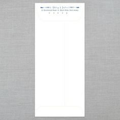 a white envelope with a note attached to the front and back of it, on a gray background