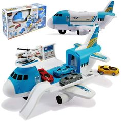 a toy airplane with cars on it and a box in the background for instructions to fly