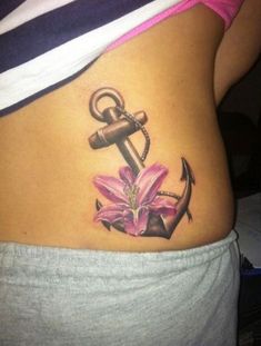 a woman's stomach with an anchor and flower tattoo on the side, which reads different tattoo designs for girls