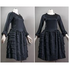 "This is a just wonderful whimsical 20s robe de style dress, made of a black silk charmeuse and blue chiffon. The dress has a scooped neckline that is trimmed in a leaf-shaped lace and has long sleeves with chiffon panels that run down the center. It has darling cuffs that are silk ruffles and are tacked up at the sleeves. The wrist is adorned with a sweet silk bow. The dress is that iconic 20s drop-waist silhouette. The skirt starts at the drop waist and has little boned panniers that are attac Elegant Black Flapper Dress For Costume, Silk Ruffled Dresses For Vintage Events, Silk Ruffle Dress For Vintage Events, Black Silk Dress For Vintage Events, Black Ruffled Dresses For Vintage Events, Vintage Black Ruffled Dress, Black Victorian Dress With Ruffles, 20s Fashion, Dress Measurements