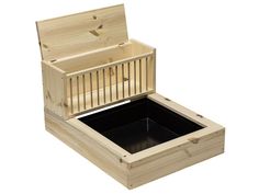 an open wooden box with the lid closed