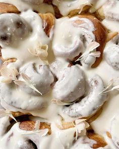 a close up view of doughnuts covered in icing