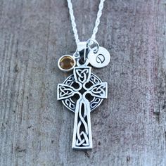 "This sterling silver light this Celtic Cross knot necklace is not just beautiful in design but also in meanings, this pendant is a symbol which emphasizes the endlessness of love of God shown through the sacrifice of Jesus on the Cross. The Celtic knot at the bottom of the cross represents friendship, affection, that cannot be broken. Also It represent the three promises of a relationship such as to love, honour, and protect; emphasizes the unity of the whole combination of the three elements. Personalized Spiritual Cross Pendant Jewelry, Spiritual Sterling Silver Cross Necklace For Anniversary, Sterling Silver Cross Pendant Necklace For Anniversary, Cross Necklace With Charms For Gifts, Cross Shaped Charm Necklace For Gifts, Sterling Silver Crucifix Necklace In Spiritual Style, Cross Charms Necklace For Gifts, Cross Charm Necklaces For Gifts, Sterling Silver Spiritual Crucifix Necklace